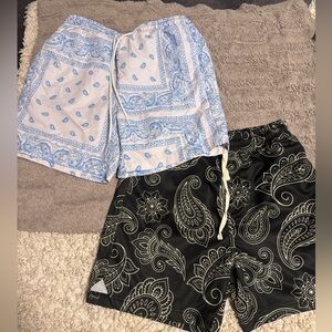 2 pairs men’s swim trunks/shorts size small
